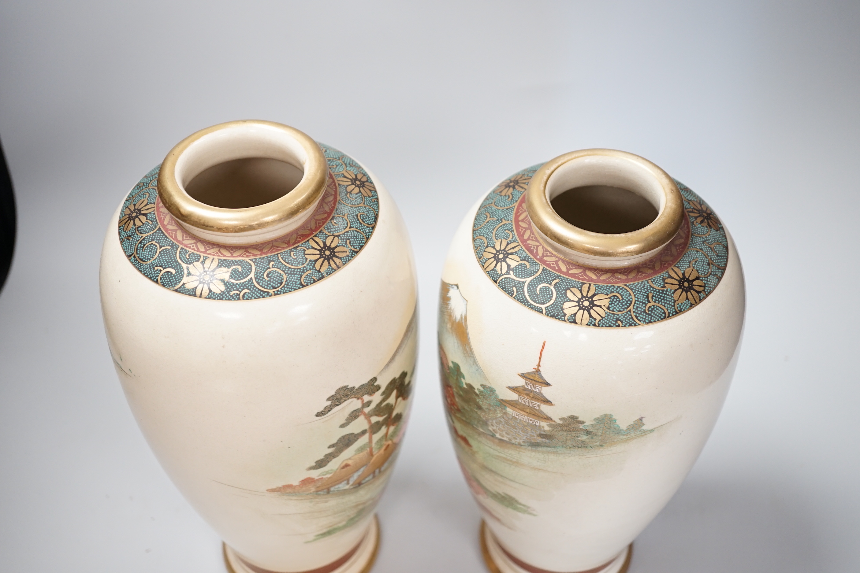 A near pair of Japanese Satsuma 'Mount Fiji' vases, 30cm